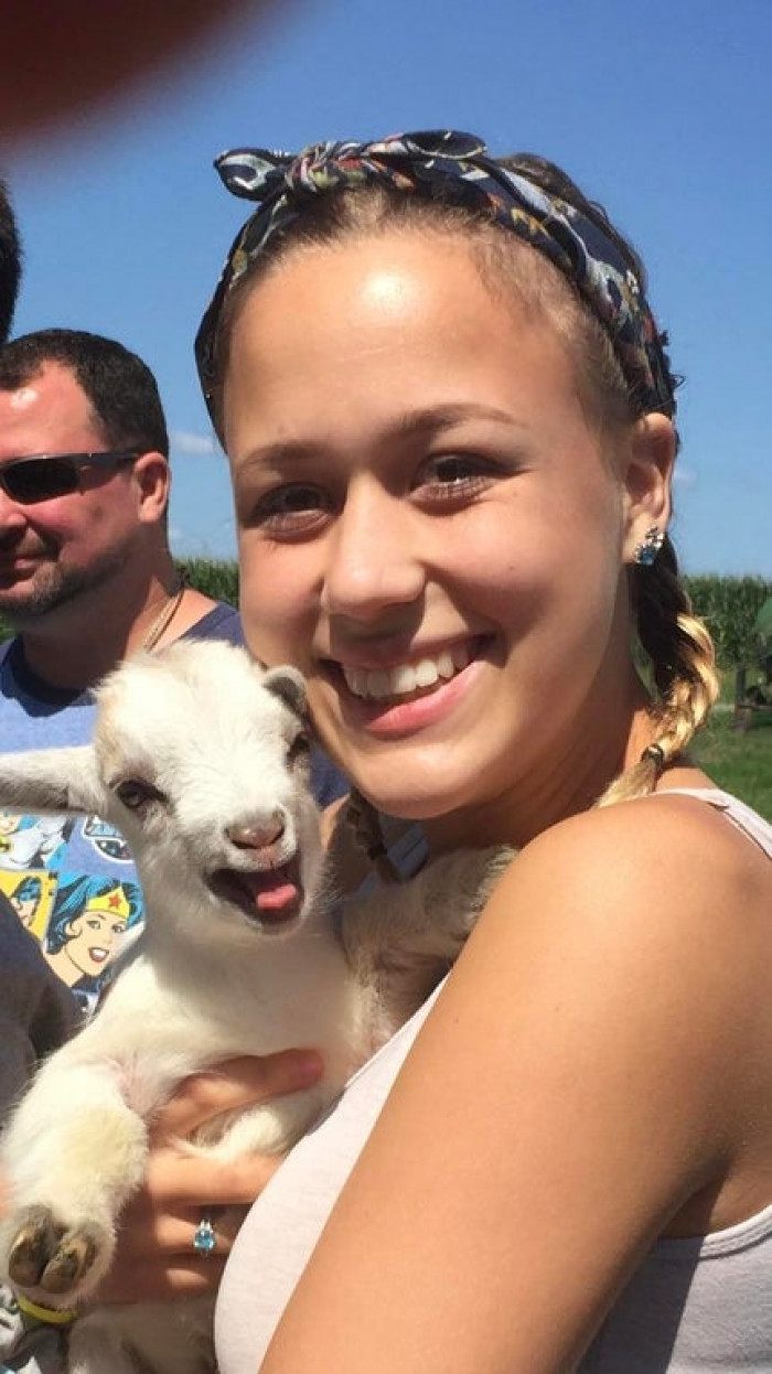 11. My fiancé befriended an overly photogenic 9 day old baby goat.